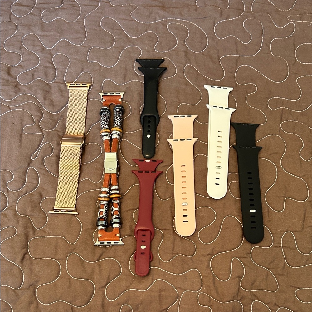 Apple Watch Bands in Black, White, Red, and Gold